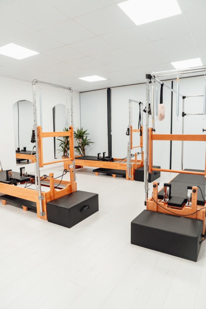 a white room with mirrors and equipment in it
