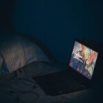 AI와 명상이 만났다: 디지털 시대의 새로운 정신건강 관리법 black laptop computer turned on on bed