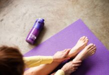 “근육이 건강을 지킨다”…일상 속 실천 가능한 근육 관리 트렌드와 꿀팁 woman in yellow pants lying on purple textile