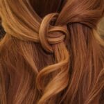 “건강한 머릿결, 일상 속 작은 변화에서 시작하세요” brown hair on white textile