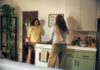 바쁜 일상 속 ‘마음 챙김 루틴’…현대인 건강 관리의 새로운 열쇠 Two women talking in a kitchen while cooking